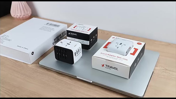 Premium universal travel adapter with 4 USB, Type-C, & fast global charging for all your devices worldwide.