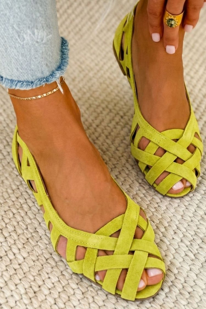 Elegant women's flat open toe summer sandals with a simple cross-strap design.
