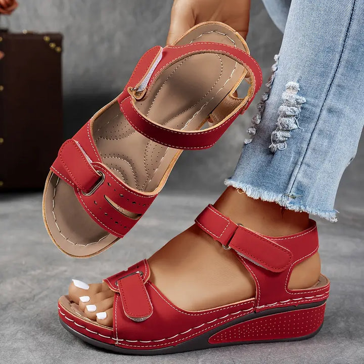 Elegant women's platform sandals with open toe and secure ankle strap, perfect chic casual footwear.