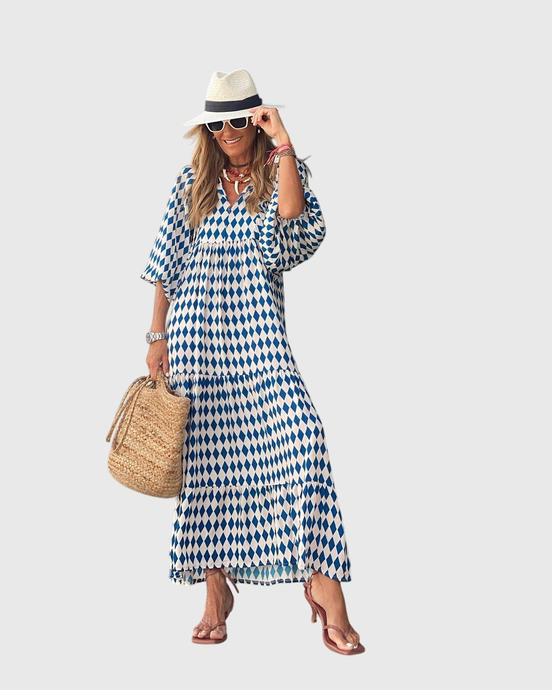 Women's versatile Bohemian flowy maxi dress, an elegant long dress for summer, resort, or casual wear.