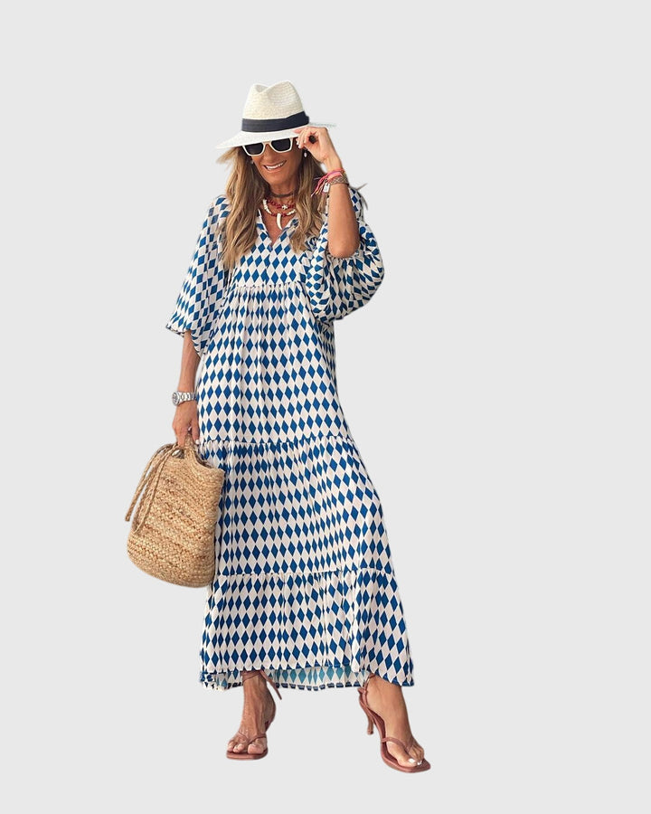 Women's versatile Bohemian flowy maxi dress, an elegant long dress for summer, resort, or casual wear.