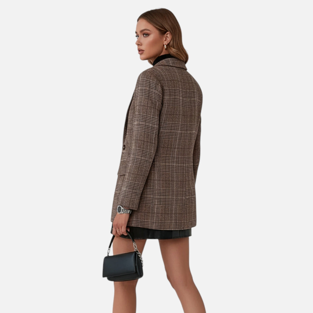 Stylish women's plaid lapel blazer. A tailored professional workwear jacket ideal for business and office settings.