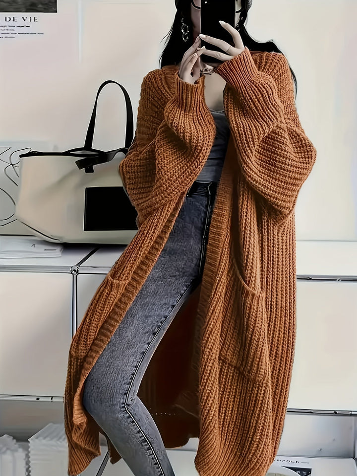 Luxurious soft knit V-neck cardigan sweater, a comfy women's button-front top for cooler days.