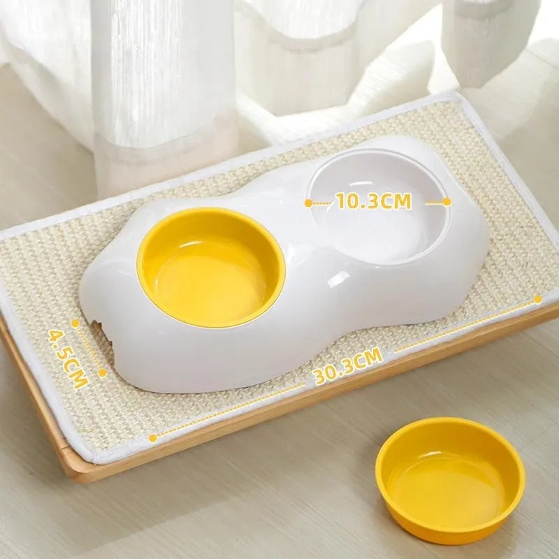 Durable yellow pet food & water bowl station featuring removable stainless steel bowls & a non-slip base for pets.