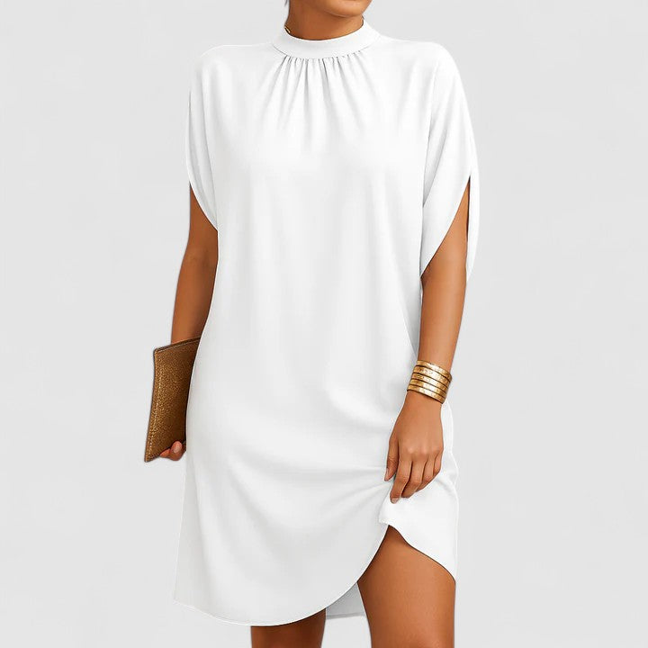 Chic women's summer dress featuring a flattering fit and stylish shoulder cutout. Versatile elegant fashion.