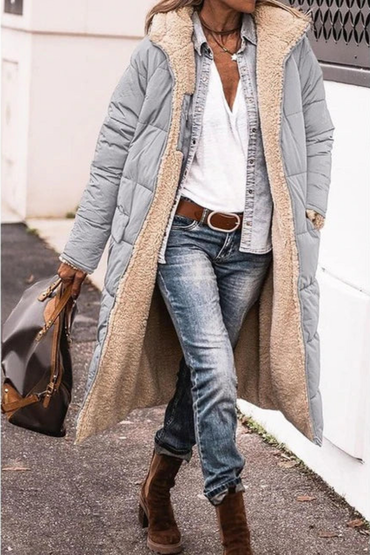 Women's waterproof windproof winter jacket. Warm, durable outerwear, perfect for cold weather activities.