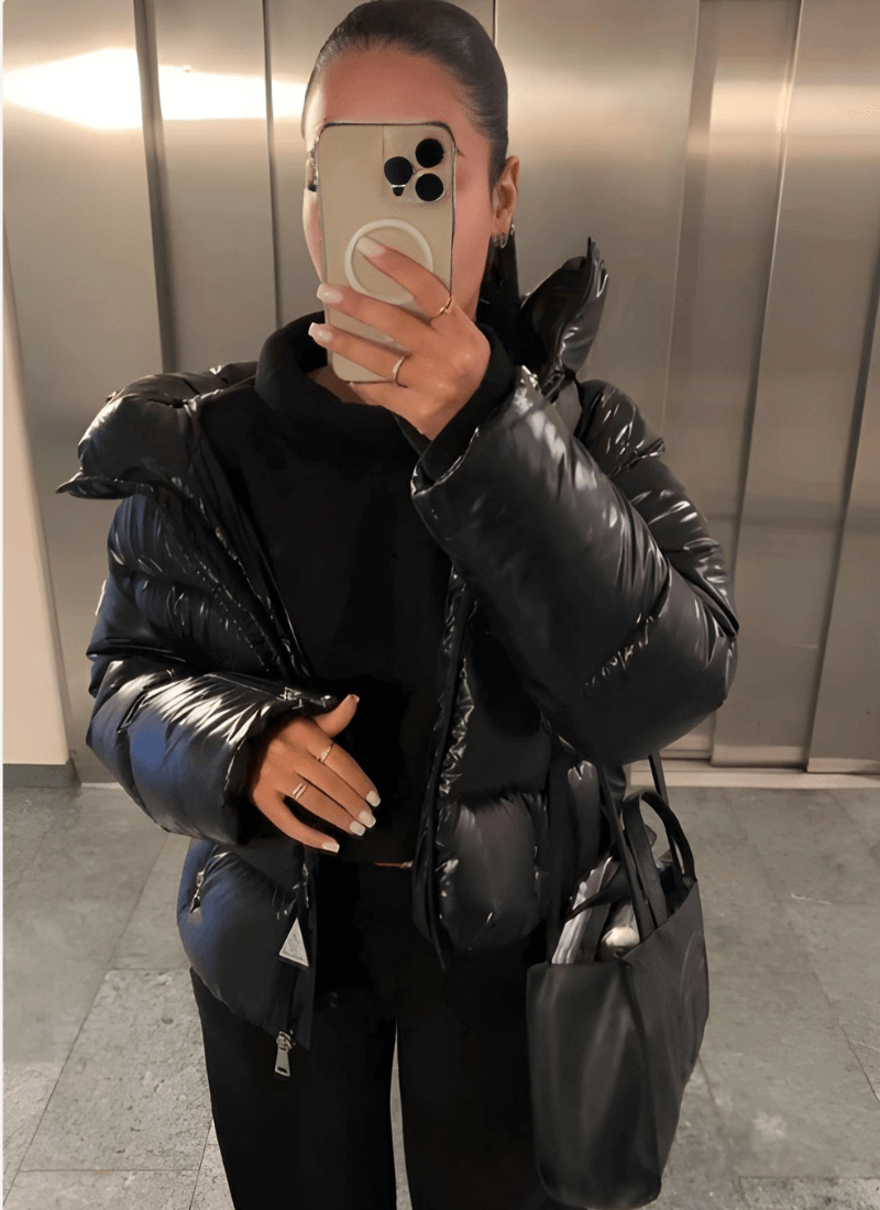 Warm & stylish women's slim-fit puffer jacket with a glossy finish, perfect winter coat for fashion-forward cold weather.