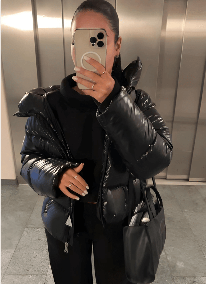 Warm & stylish women's slim-fit puffer jacket with a glossy finish, perfect winter coat for fashion-forward cold weather.