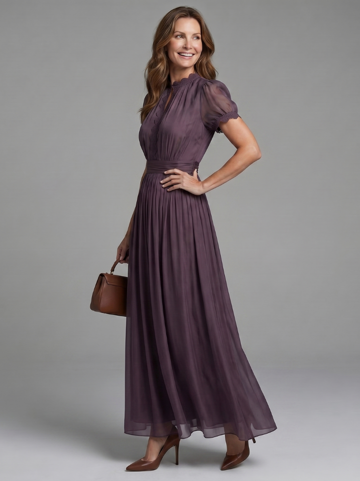 Chic women's short sleeve maxi dress in purple, featuring a keyhole and comfortable gathered waist.