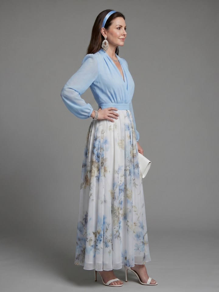 Women's V-neck floral maxi dress with sheer sleeves and bodice, an elegant choice for evening wear or occasions.