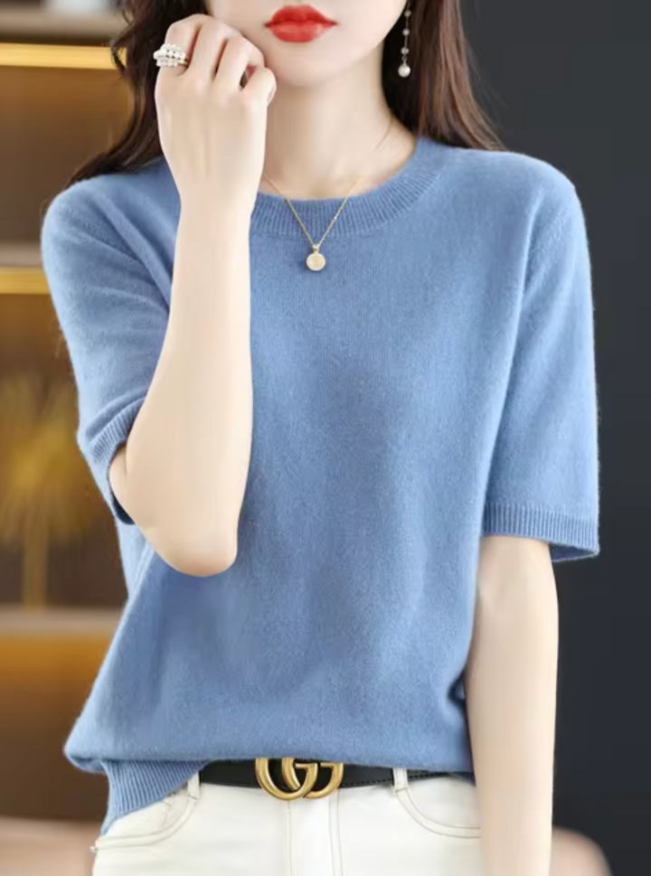 Slim-fit women's knit sweater with short sleeves. An elegant & versatile everyday fashion top.