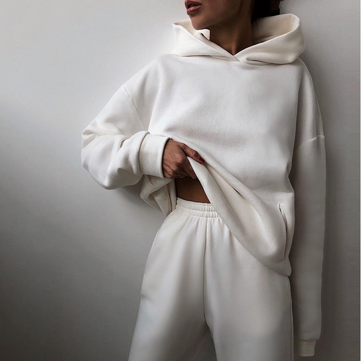 Modern women's tracksuit: chic activewear and cozy loungewear. A versatile, comfortable, and stylish sporty set.