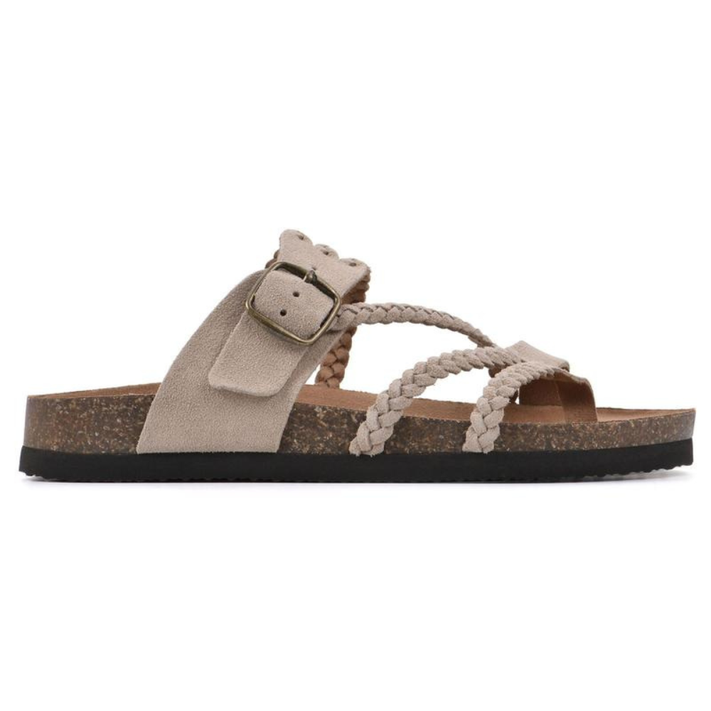 Stylish women's slip-on sandals with arch support, ideal for casual summer walks and comfort.