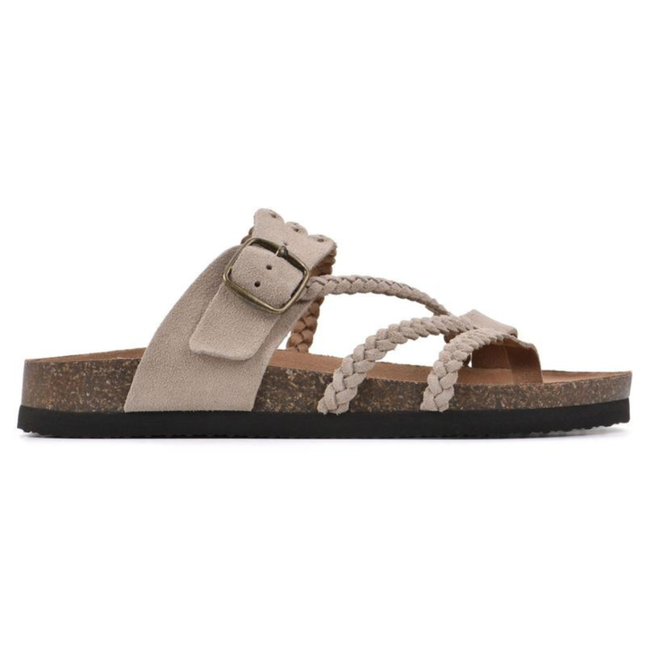 Stylish women's slip-on sandals with arch support, ideal for casual summer walks and comfort.
