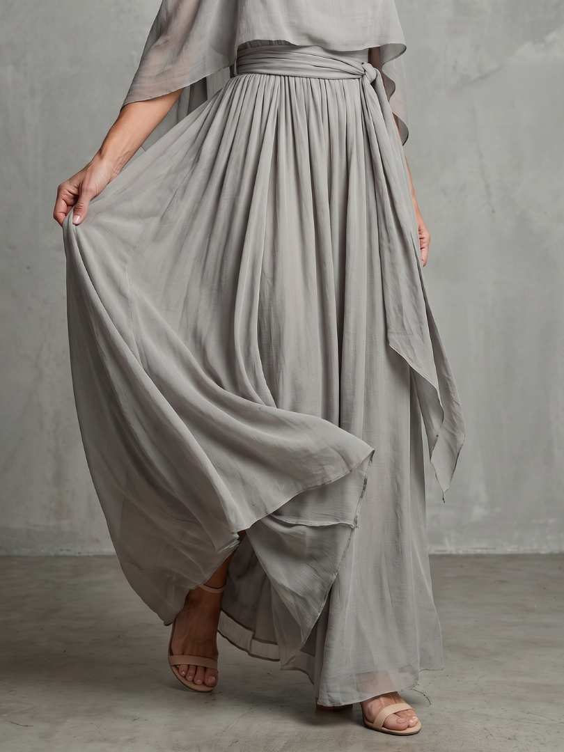 Stylish women's grey layered cold shoulder top & wide leg pants set. Versatile two-piece for spring & summer.