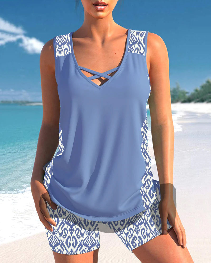 Draped criss-cross tankini for women, a comfortable and fashionable printed two-piece swimsuit.
