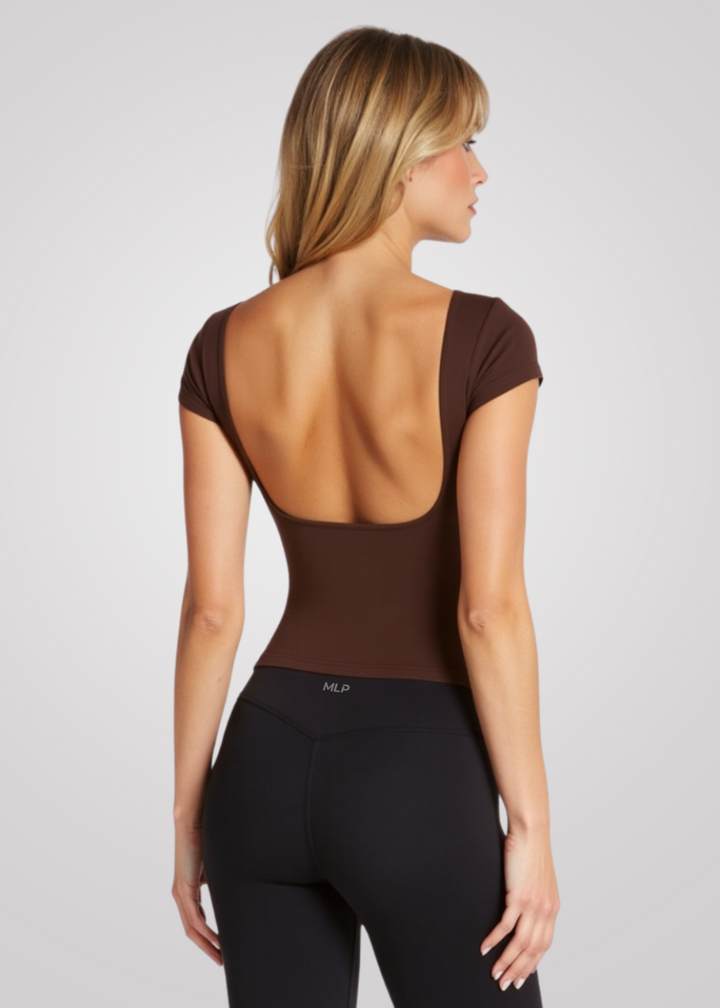 Comfortable women's athletic top, Flow T-Shirt with built-in bra, light support for daily wear.