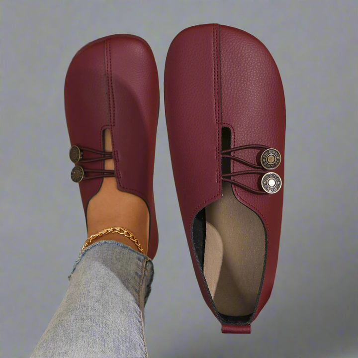 Stylish women's slip-on moccasins in a classic solid color, ideal for work or casual elegance.