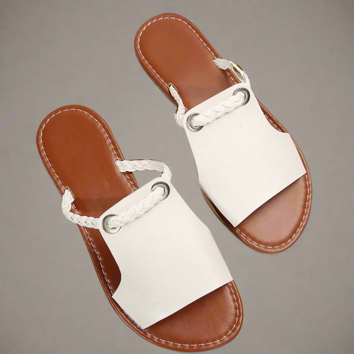 Comfortable women's flat summer sandals, ideal for beach, vacation, and stylish everyday casual footwear.
