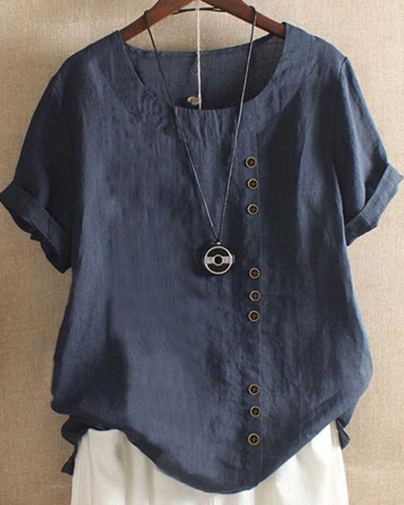 Modern minimalist ladies top with short sleeves & round neck, ideal for effortless casual style.