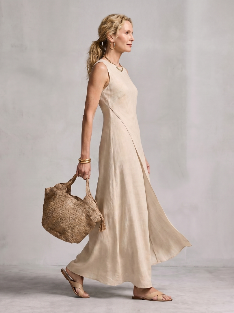 Elegant women's flowy asymmetric layered maxi dress, ideal for casual summer fashion or vacation.