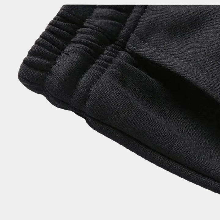 Stylish men's tracksuit set for spring/autumn fashion. Features a cozy hoodie and matching sweatpants for ultimate comfort.