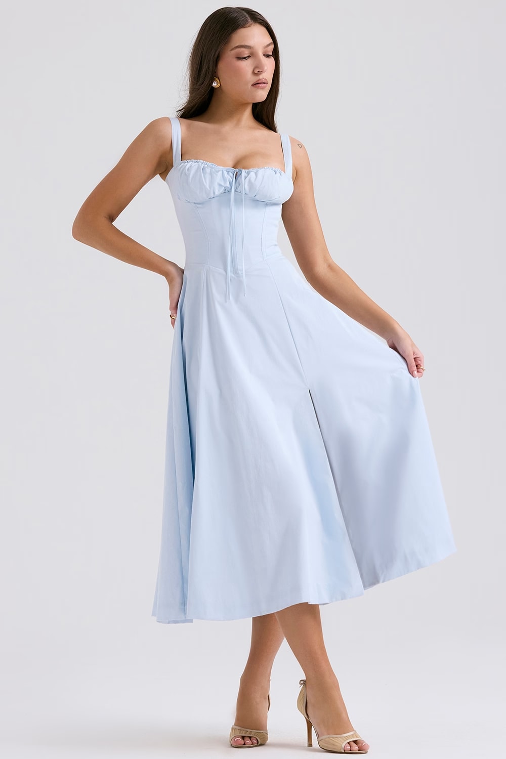 Front view of a women's elegant midi dress, featuring a lace-up corset bodice. Party style.