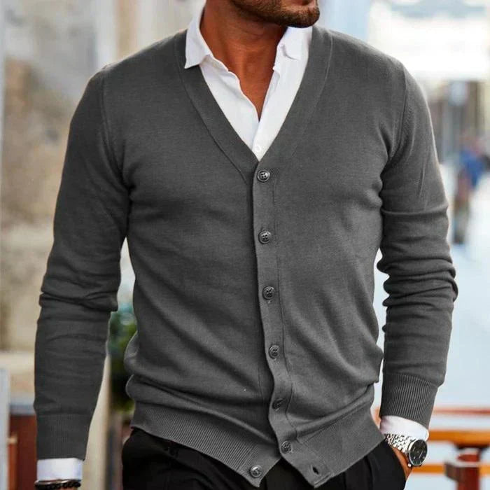 Classic men's fashion long sleeve button-down V-neck cardigan, a cozy knitted sweater with ribbed trim.