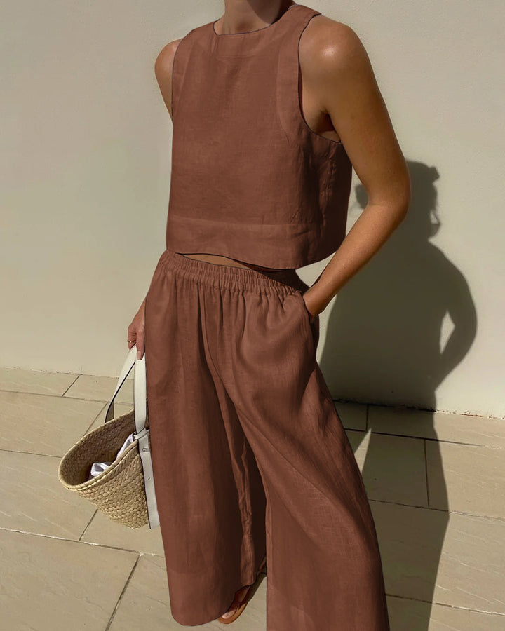 Effortless chic women's two-piece outfit featuring a versatile crop top and flowy wide-leg pants, ultimate comfort.