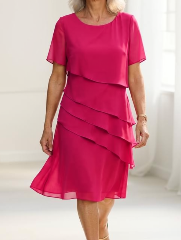 Feminine & elegant women's flowing midi dress with ruffled details & sheer sleeves, perfect for stylish wear.