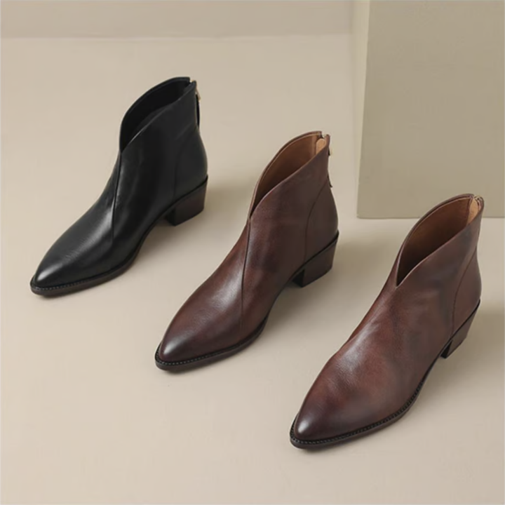 Slip-on elegant women's ankle boots in brown, versatile for comfortable fall and winter style.