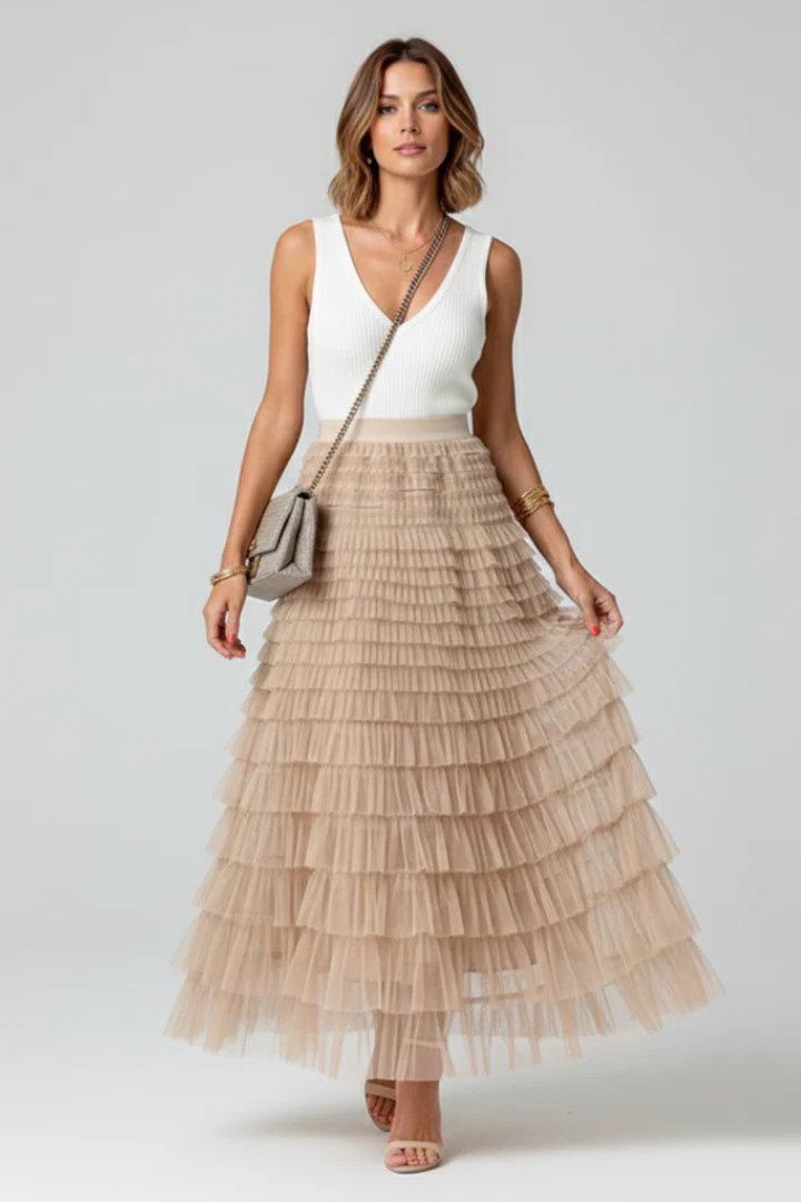 Chic high-waisted tiered midi skirt for women, featuring elegant layers & a comfortable, flowy fit.