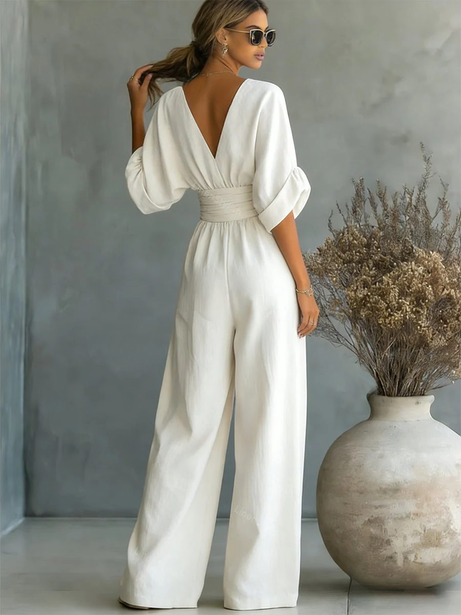 Chic women's V-neck jumpsuit, ideal for professional work settings & sophisticated weekend outfits.