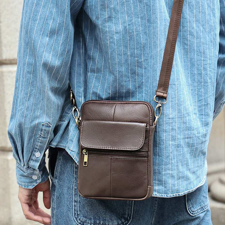 Modern men's compact shoulder bag. Stylish crossbody for everyday essentials, travel, and accessories.