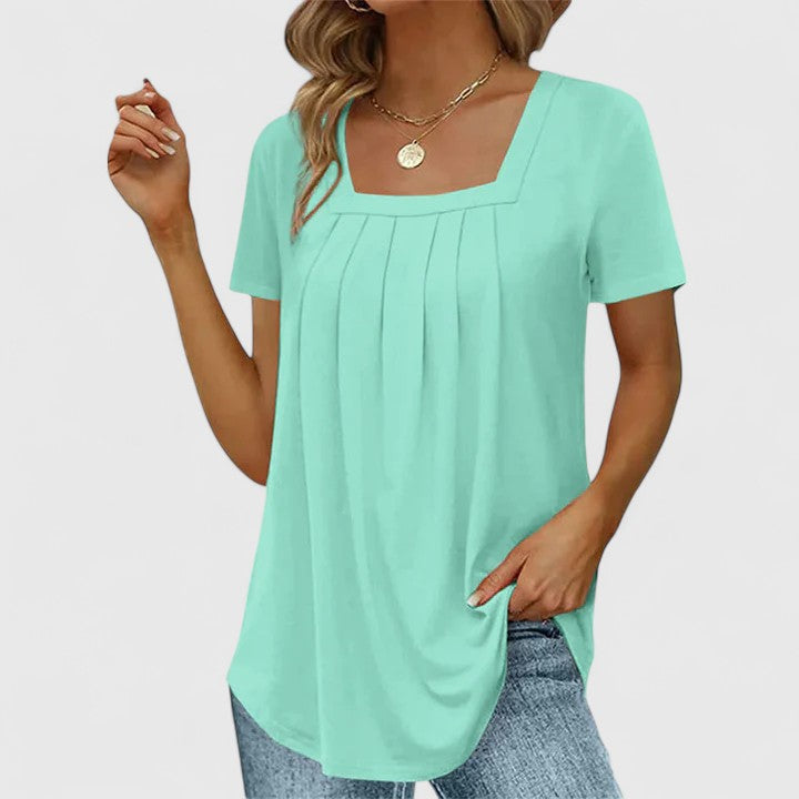 Chic women's square neck summer blouse, perfect for casual or office wear. Comfortable short sleeve top.