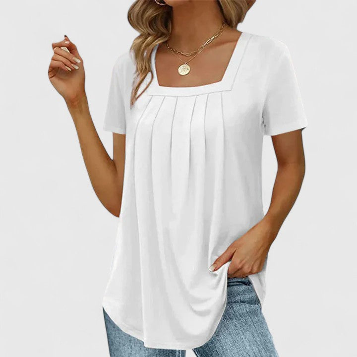 Stylish pleated summer blouse for women, relaxed fit & square neckline. Ideal for warm weather.