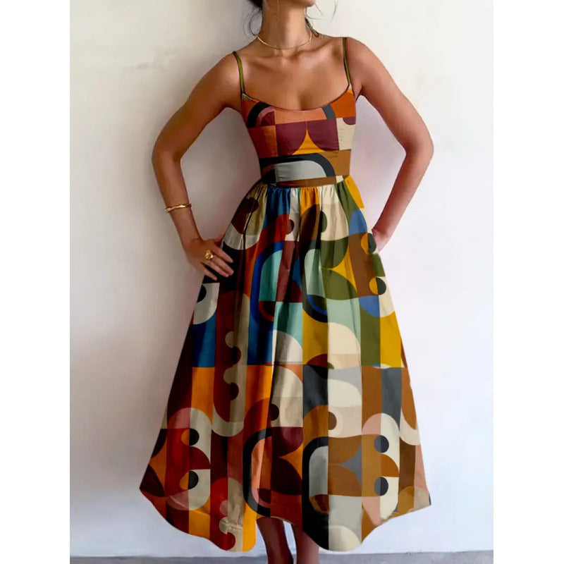 Women's modern geometric print sleeveless A-line midi dress. Effortless, elegant style for summer or occasion wear.