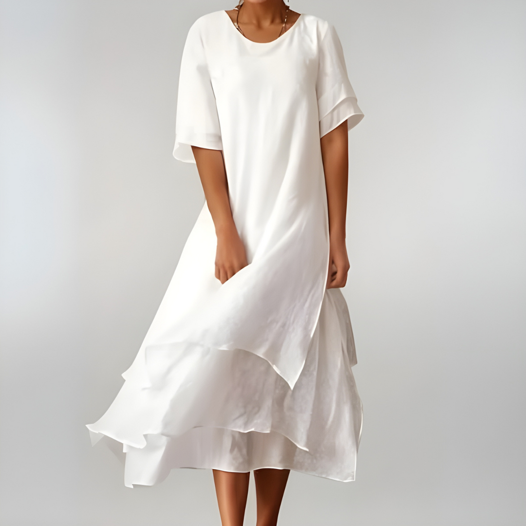 Blue lightweight summer maxi dress for women. Flowing, comfortable, and versatile for casual or vacation wear.