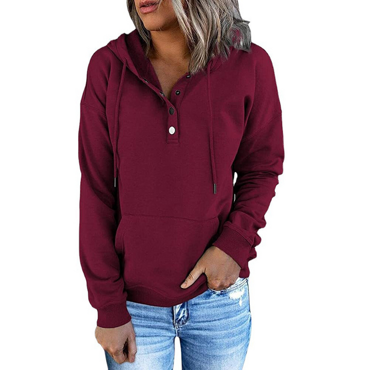 Fashion-forward women's pullover sweatshirt, combining designer elegance with long sleeve comfort.