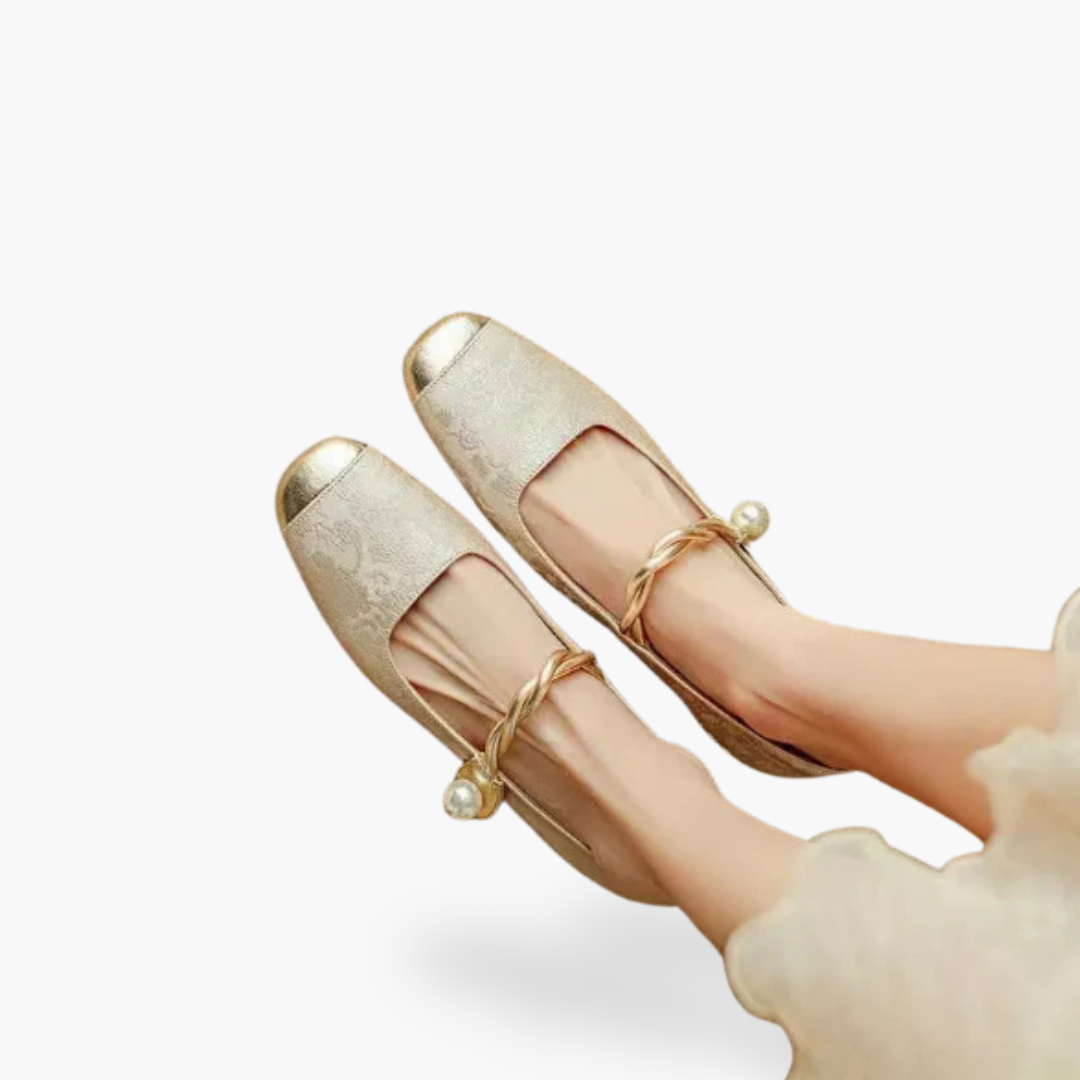 Stylish women's beige Mary Jane flats with a comfortable design, ideal for everyday wear and elegant casual outfits.