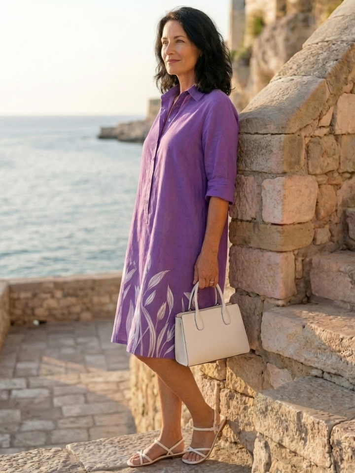 Casual floral knee-length dress for women, featuring three-quarter sleeves & a collared neck.