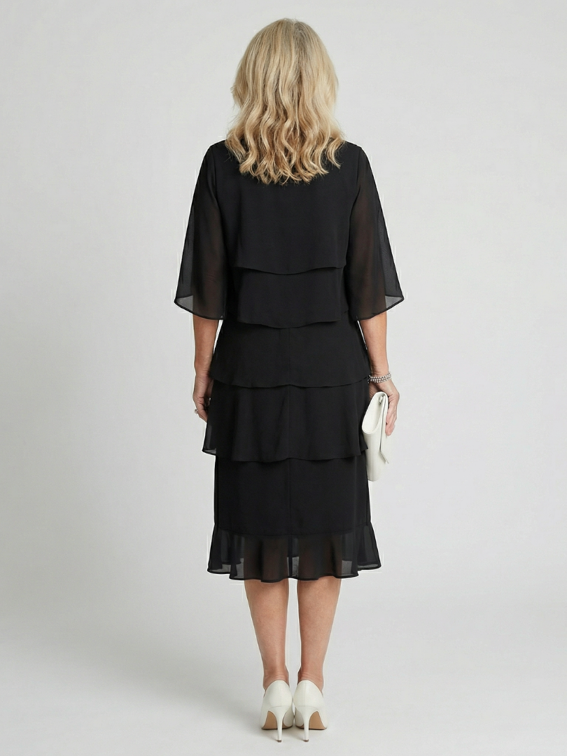 Comfortable layered midi dress for women, round neck and relaxed fit, perfect for summer.