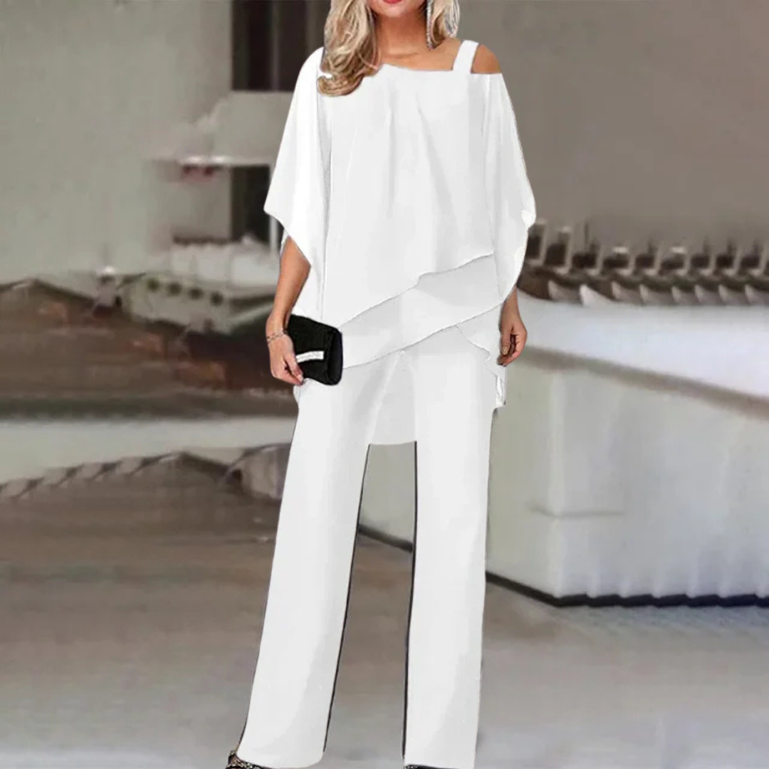 Formal women's 2-piece off-shoulder chiffon jumpsuit outfit. Ideal for parties, evening events, or elegant wear.