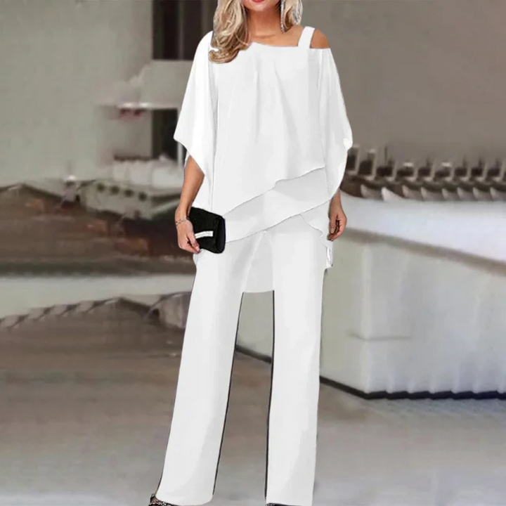 Formal women's 2-piece off-shoulder chiffon jumpsuit outfit. Ideal for parties, evening events, or elegant wear.
