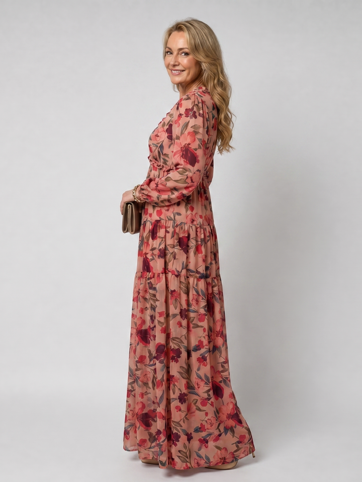 Relaxed fit women's long sleeve maxi dress with vibrant floral print and beautiful tiered skirt.