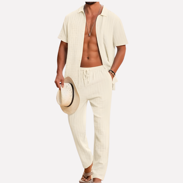 Stylish men's co-ord set featuring a textured summer shirt & relaxed casual trousers.