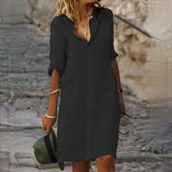 Chic women's casual midi dress, designed for elegant everyday comfort. Ideal versatile summer wear.