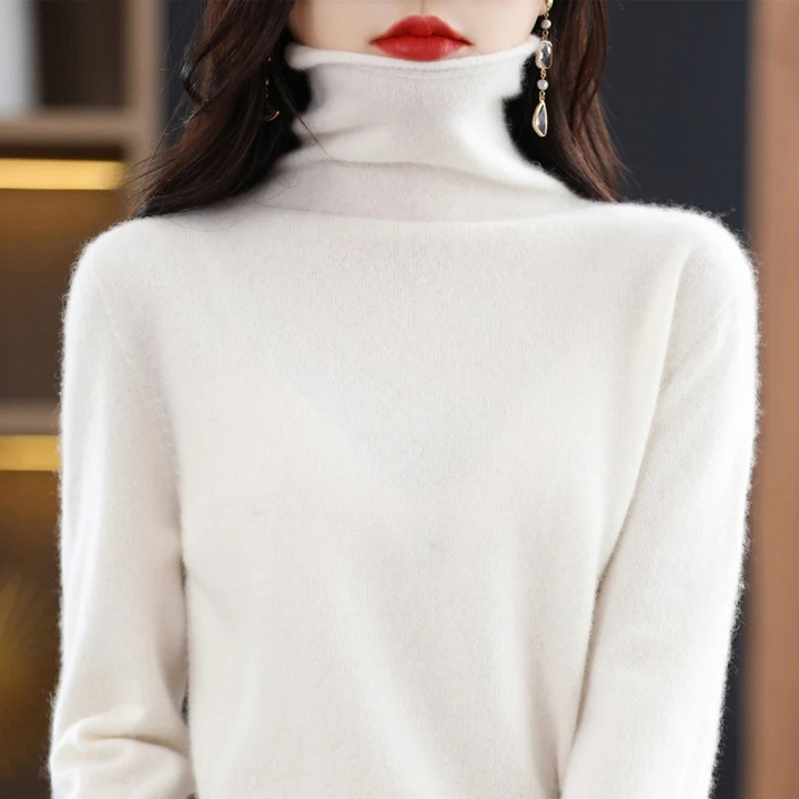 Stylish women's soft roll neck. Long sleeve top, versatile for autumn and winter.