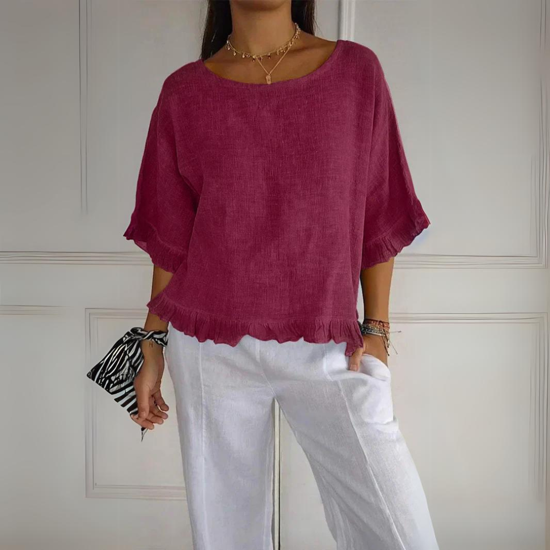 Lightweight women's ruffle shirt blouse, ideal for summer ready style or all-season elegant comfort. Versatile top.