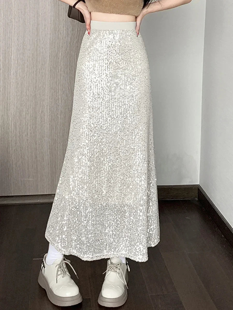 White sequin low-rise maxi skirt for women, with elastic waist. Glamorous for summer fashion, parties & evening wear.